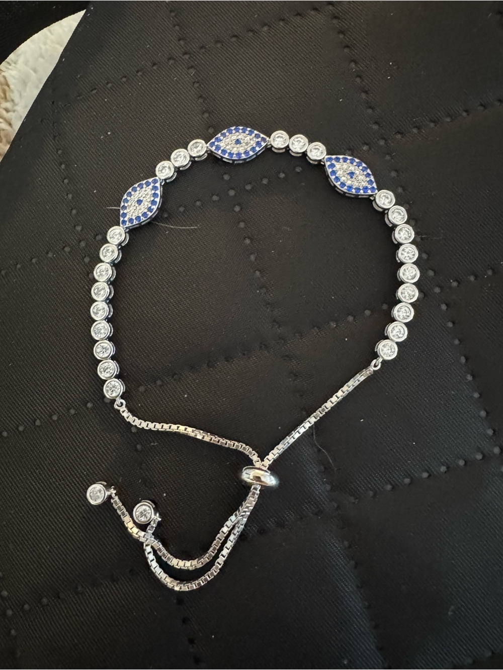 Hamsa Bolo
Bracelet Sterling Silver, Sapphire, Cubic Zirconia Adjustable